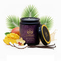Tropical Embrace premium jar candle, mango coconut vanilla aromatherapy.